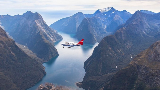 FLIGHT OVER MILFORD SOUND IN NEW ZEALAND